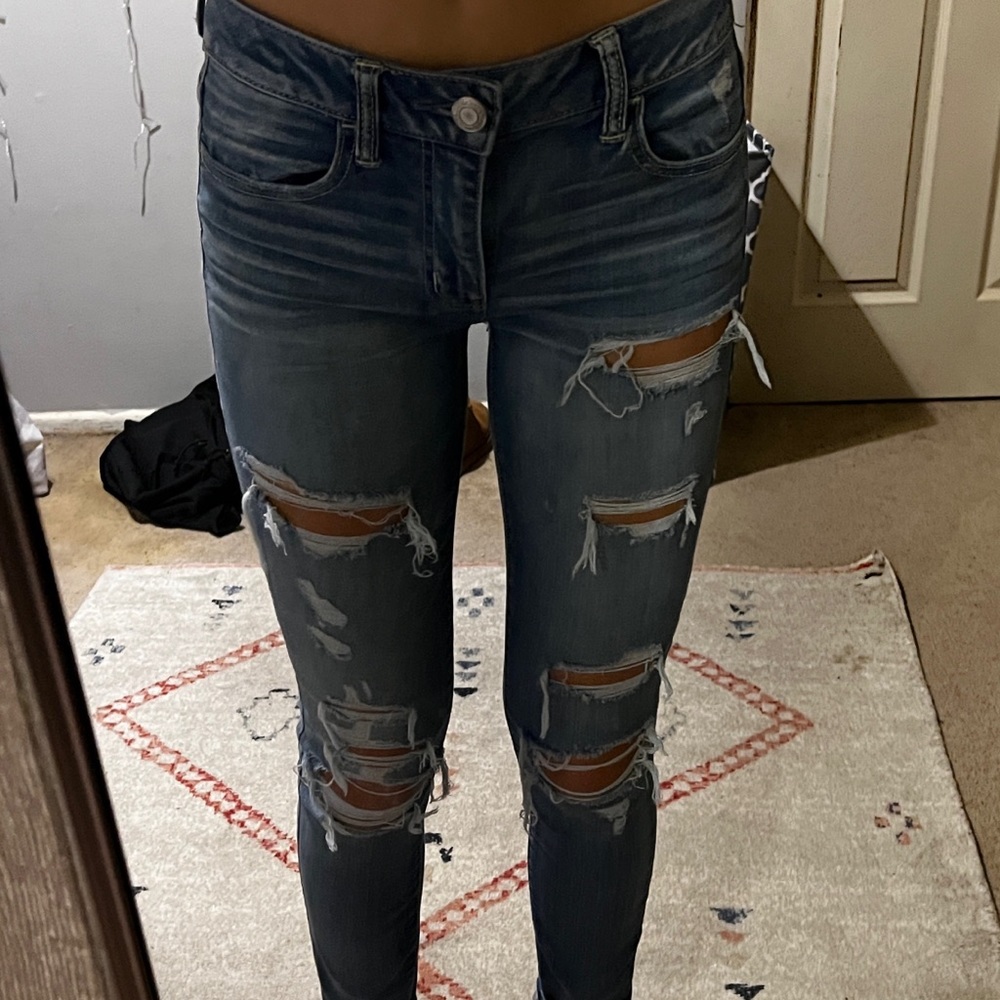 distressed american eagle low rise jeans